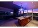 Modern kitchen featuring granite counters, stainless appliances, island with seating and an amazing city view at 4471 Dean Martin Dr # 2101, Las Vegas, NV 89103