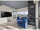 Bright living room with large windows, comfortable seating, and a modern television at 4471 Dean Martin Dr # 2101, Las Vegas, NV 89103