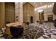 Grand lobby featuring modern furnishings, high ceilings, and a stylish chandelier at 4471 Dean Martin Dr # 2101, Las Vegas, NV 89103