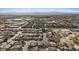 Wide aerial shot of a residential community, highlighting the neighborhood layout and local amenities nearby at 4632 Cantina Rey St, North Las Vegas, NV 89081