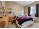 Bedroom with bed, curtains and light at 4632 Cantina Rey St, North Las Vegas, NV 89081