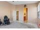 Spacious bedroom showing doorway leading to bathroom with natural light from the window at 4632 Cantina Rey St, North Las Vegas, NV 89081