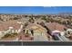 Charming home featuring desert landscaping, a two-car garage, and a serene neighborhood setting with mountain views at 4632 Cantina Rey St, North Las Vegas, NV 89081