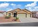 Charming single-story home featuring a two-car garage and desert landscaping at 4632 Cantina Rey St, North Las Vegas, NV 89081