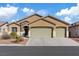 Charming single-story home featuring a two-car garage and desert landscaping at 4632 Cantina Rey St, North Las Vegas, NV 89081