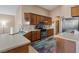 Well-equipped kitchen featuring granite countertops, stainless steel appliances, and ample cabinet space at 4632 Cantina Rey St, North Las Vegas, NV 89081
