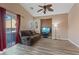 Bright and airy living room with hard surface floors, neutral walls, recessed lighting, and a sliding glass door at 4632 Cantina Rey St, North Las Vegas, NV 89081