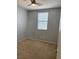 Small bedroom featuring neutral paint, carpet, and a window for natural light at 4912 Capo Gallo St, Las Vegas, NV 89130