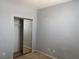 Bedroom featuring neutral paint, carpet, and a closet with sliding doors at 4912 Capo Gallo St, Las Vegas, NV 89130