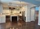 Open kitchen with stainless steel appliances, marble backsplash, and a modern island at 4912 Capo Gallo St, Las Vegas, NV 89130