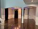 Open living space with hardwood floors, modern lighting, and recessed ceilings at 4912 Capo Gallo St, Las Vegas, NV 89130