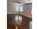 Spacious living room with hardwood floors and plenty of natural light at 4912 Capo Gallo St, Las Vegas, NV 89130