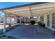 Back patio area with an outdoor grill, seating, planters, and direct access to the house at 5582 Tunis Ave, Las Vegas, NV 89122