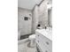 Modern bathroom featuring a tiled walk-in shower and updated vanity at 5582 Tunis Ave, Las Vegas, NV 89122