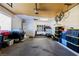 Spacious garage featuring modern laundry, exercise equipment, tool storage, and good lighting at 5582 Tunis Ave, Las Vegas, NV 89122
