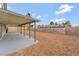 The backyard has a large patio and xeriscaped with a rock ground cover at 5815 Christchurch Ave, Las Vegas, NV 89110