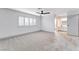Spacious bedroom with plantation shutters and access to a private bathroom at 5815 Christchurch Ave, Las Vegas, NV 89110