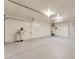 Spacious garage with sealed concrete flooring and water filtration system at 5815 Christchurch Ave, Las Vegas, NV 89110