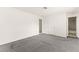 Bright bedroom with neutral carpet and multiple closets offering ample storage space at 6155 W Twain Ave, Las Vegas, NV 89103