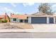 Charming single-story home with a two-car garage and low-maintenance front yard landscaping at 6155 W Twain Ave, Las Vegas, NV 89103