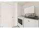 Laundry room features a washer and dryer at 6155 W Twain Ave, Las Vegas, NV 89103