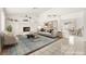 Inviting living room with fireplace, tile flooring, and neutral decor with lots of natural light at 6155 W Twain Ave, Las Vegas, NV 89103