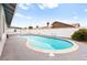 Backyard pool with a patio and privacy wall, perfect for relaxation and outdoor fun at 6155 W Twain Ave, Las Vegas, NV 89103