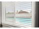 Window view of the private pool area, offering a glimpse of outdoor relaxation and enjoyment at 6155 W Twain Ave, Las Vegas, NV 89103