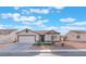 Charming single-story home with a two-car garage and low-maintenance desert landscaping at 629 Majestic Sky Dr, North Las Vegas, NV 89031