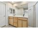 Double sink bathroom vanity with plenty of counter space and cabinet storage at 6622 Palm Branch St, North Las Vegas, NV 89086