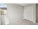 Bedroom boasts a built-in closet and large window, providing storage and natural light at 6622 Palm Branch St, North Las Vegas, NV 89086