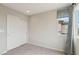 Bedroom boasts a built-in closet and large window, providing storage and natural light at 6622 Palm Branch St, North Las Vegas, NV 89086