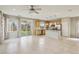 Open-concept design combines living space and kitchen featuring an island, stainless steel appliances, and backyard access at 6622 Palm Branch St, North Las Vegas, NV 89086