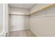 Walk-in closet featuring carpeted flooring and shelving for optimal storage at 6622 Palm Branch St, North Las Vegas, NV 89086