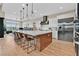 Beautiful kitchen with stainless steel appliances, a large island, and plenty of space for cooking and entertaining at 6690 Interstellar St, Las Vegas, NV 89135