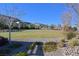 Lush park with walking trails, mature trees, and scenic views, providing a tranquil space for outdoor activities and relaxation at 6690 Interstellar St, Las Vegas, NV 89135
