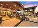 Expansive patio with outdoor lounge furniture, pizza oven, and a built-in grill, great for entertaining guests and relaxation at 6690 Interstellar St, Las Vegas, NV 89135