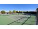 A well-maintained tennis court, fenced-in and ready for friendly matches or serious training in a community setting at 6690 Interstellar St, Las Vegas, NV 89135