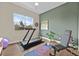 Workout room featuring a treadmill, exercise bench, and a yoga mat at 6690 Interstellar St, Las Vegas, NV 89135