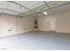 Spacious two car garage with epoxy floor, insulated door, and water heater at 6712 Biltmore Garden St, Las Vegas, NV 89149