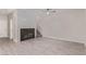 Bright living room features modern flooring, fireplace, and stylish ceiling fan for comfortable living at 6712 Biltmore Garden St, Las Vegas, NV 89149