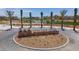Galaxy Park community entrance with desert landscaping, monument sign, and well-maintained roundabout at 7305 Halo Falls St, North Las Vegas, NV 89084