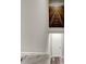 Hallway featuring wood-look floors and a dramatic artwork installation of train tracks at 7305 Halo Falls St, North Las Vegas, NV 89084