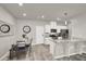 Bright kitchen featuring a dining area, stainless steel appliances, and a granite countertop island at 7305 Halo Falls St, North Las Vegas, NV 89084