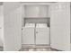 Convenient laundry closet equipped with a washing machine and dryer at 7305 Halo Falls St, North Las Vegas, NV 89084