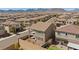 Aerial view of a neighborhood featuring matching two-story homes with tile roofs and desert landscaping at 8106 Skye Glen St, Las Vegas, NV 89166