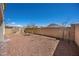 Backyard featuring low-maintenance gravel landscaping and a sturdy brick perimeter wall at 8106 Skye Glen St, Las Vegas, NV 89166