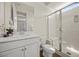Bright bathroom with a walk-in shower, white vanity, and modern fixtures at 8106 Skye Glen St, Las Vegas, NV 89166