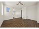 Empty bonus room with wood floors, large windows, and a ceiling fan at 8106 Skye Glen St, Las Vegas, NV 89166