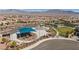 Community park and playground with covered seating, tennis courts, and desert landscaping at 8106 Skye Glen St, Las Vegas, NV 89166